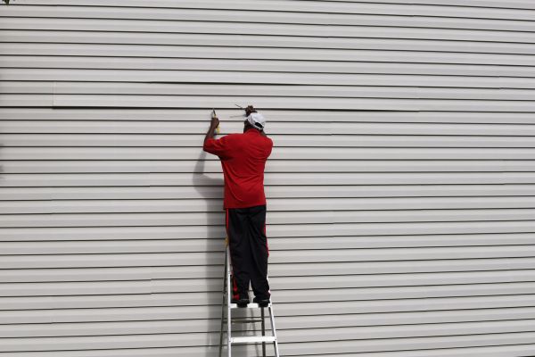 Loose Siding Repair in Katy