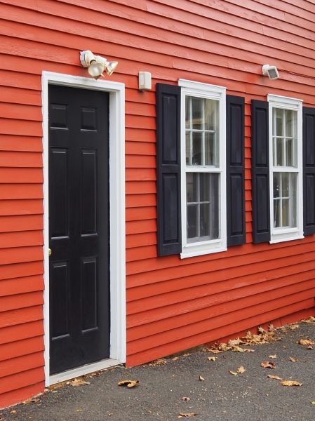 Red Vinyl Siding Installation in Katy
